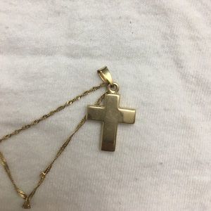 Gold cross pendant
